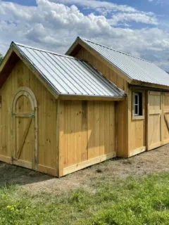 Wooden barn with round door
