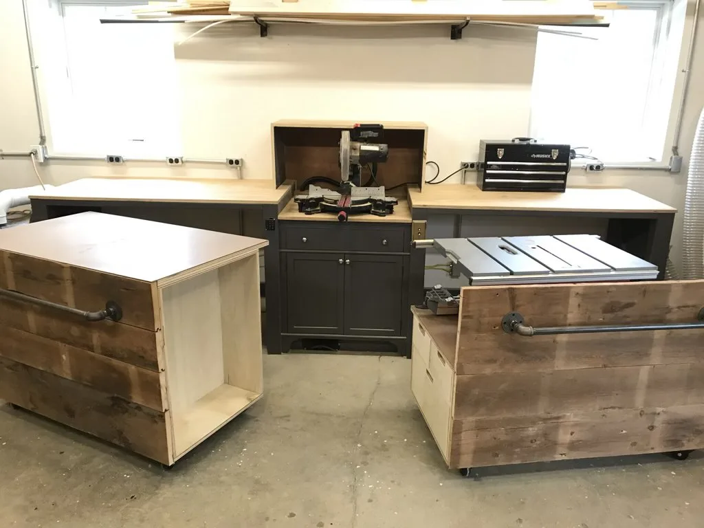 Reclaimed wood fronts on rolling workshop cabinets