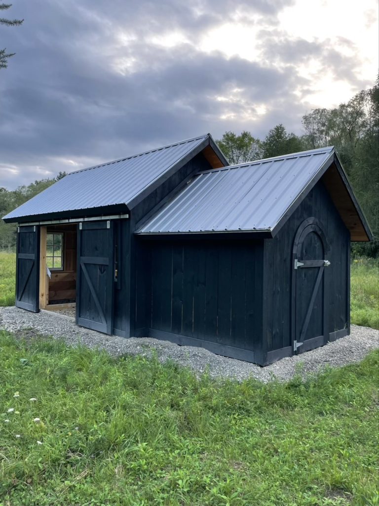 black round top shed door
