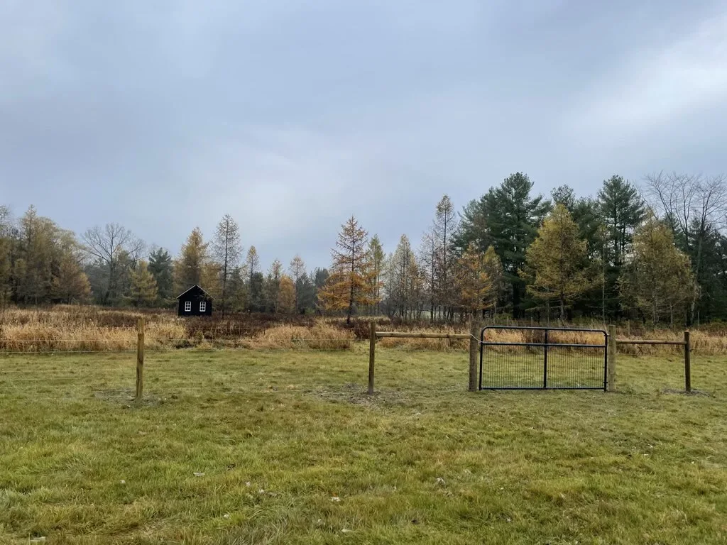 Woven wire fence installation in ranch house with acreage