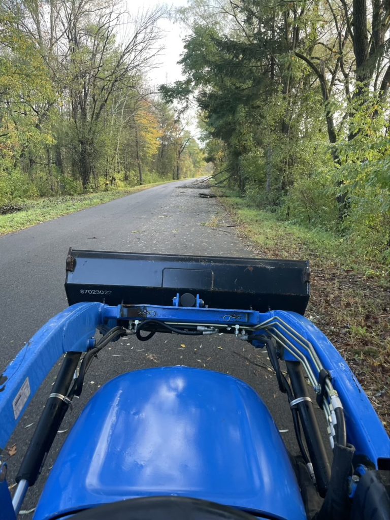 Moving down trees on a tractor