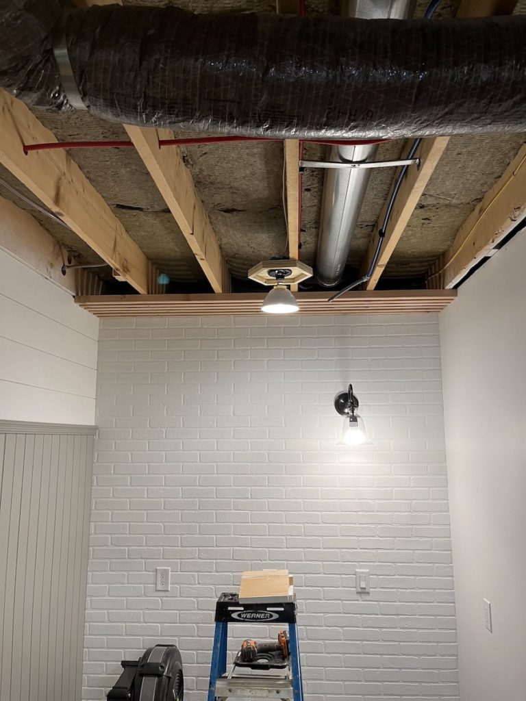 process of installing basement slat ceiling