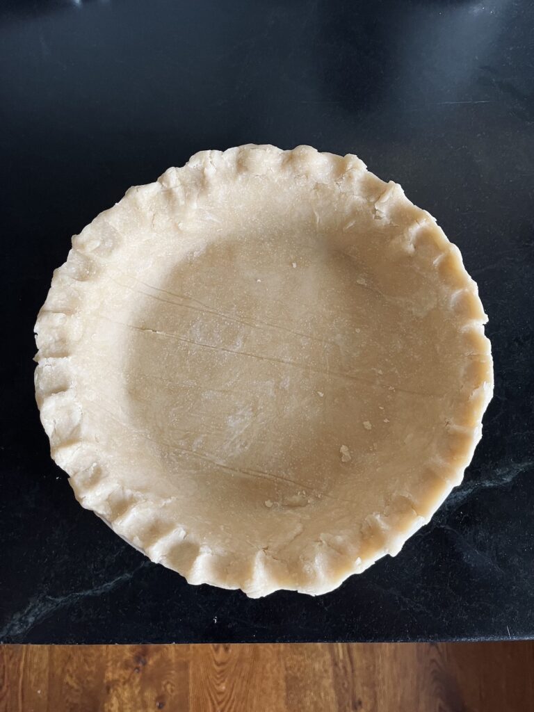 Oil pie crust ready to be baked