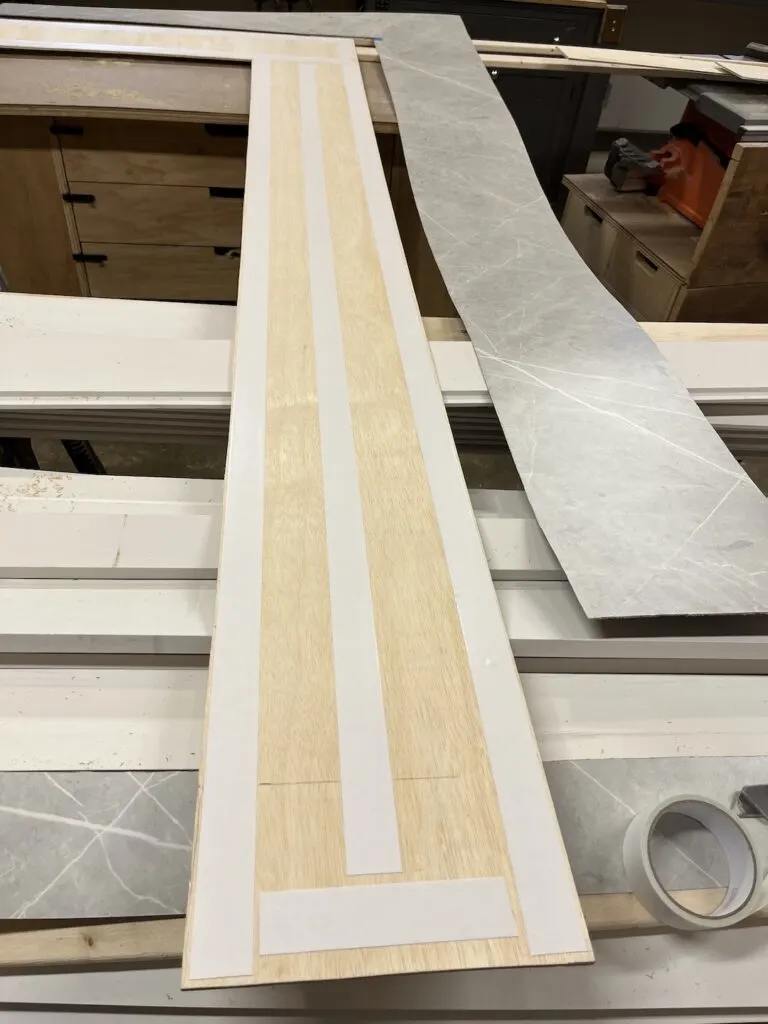 Double sided tape on plywood