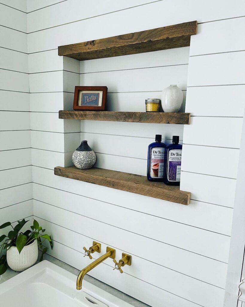 Recessed wall shelves with reclaimed wood over shiplap