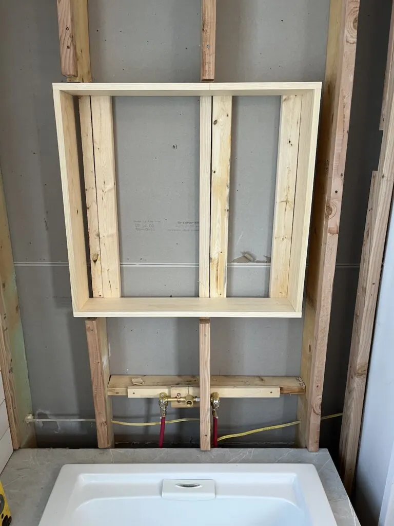 Lining up framing for tub alcove recessed shelves