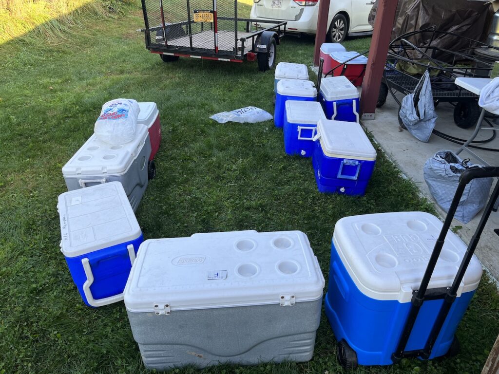 Coolers with ice in them waiting for the chickens