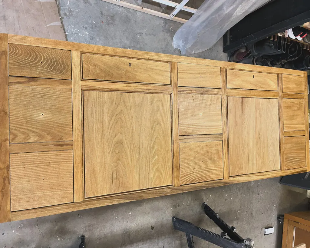 Finished bleached red oak vanity with walrus butter furniture finish