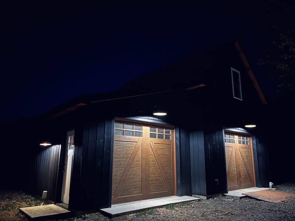 Black barn light up at night